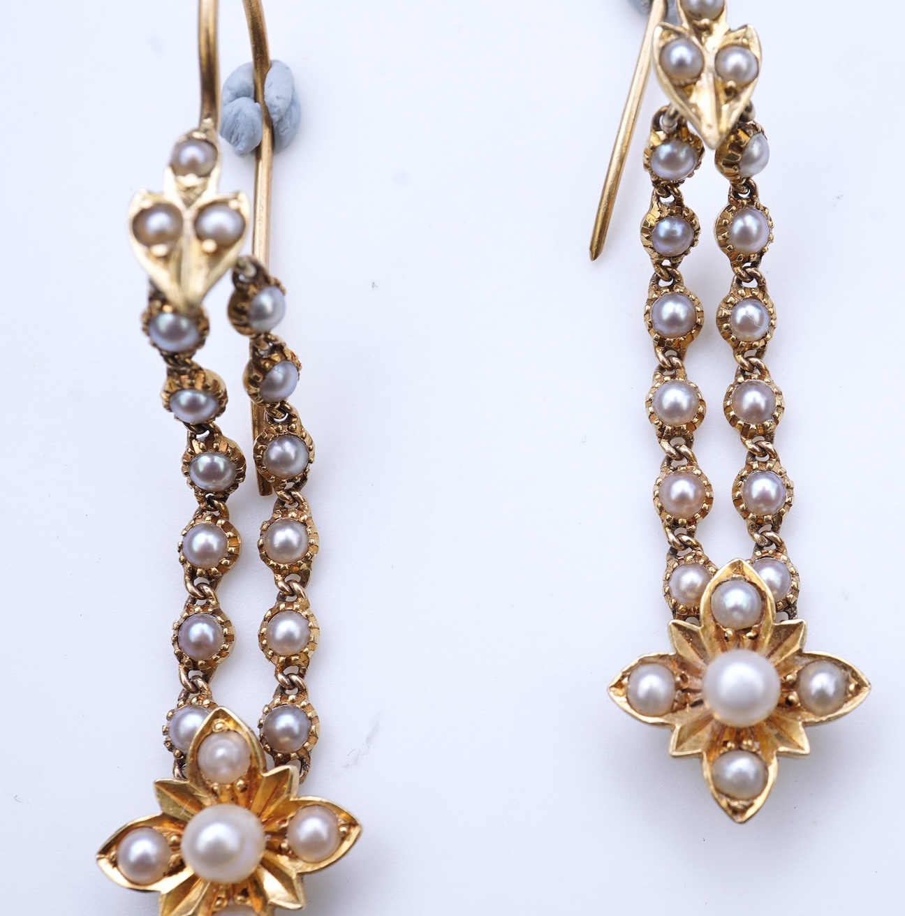 A pair of Edwardian seed pearl earrings, early 20th century composite